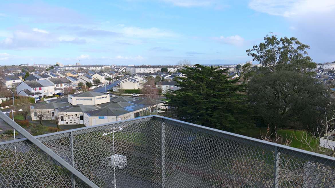 Appartement T3 avec balcon et stationnement